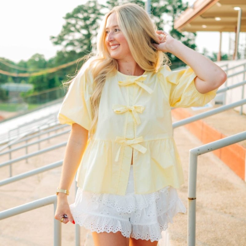 Yellow Bow Front Peplum Blouse