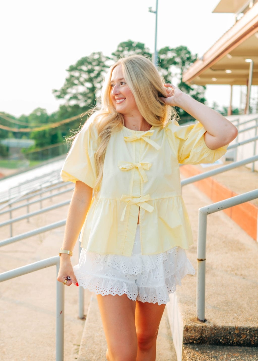 Yellow Bow Front Peplum Blouse
